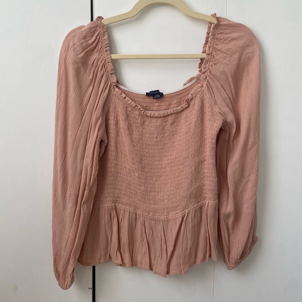 tight top with big sleeves